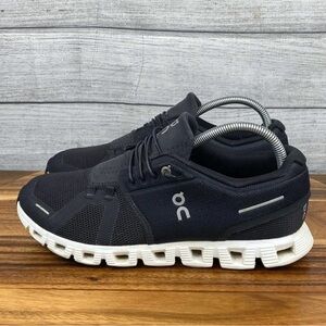 On Running Black and White Sneakers with CloudTec Sole